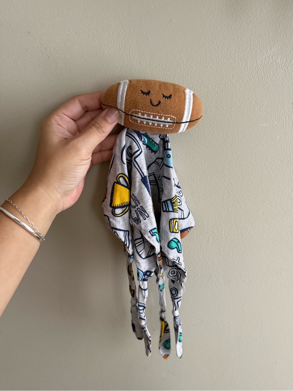 Little Sleepies Brown Football Lovey with Patterned Tentacles